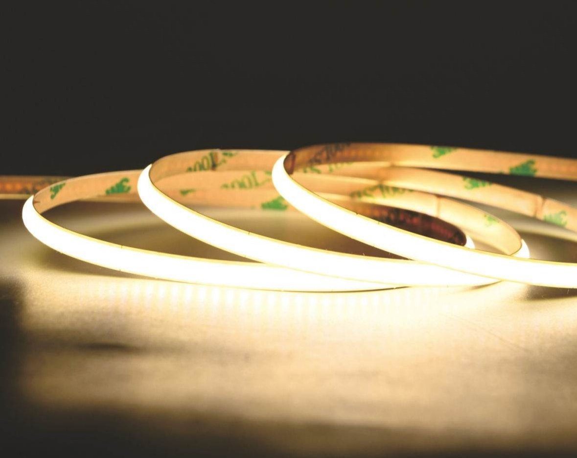 Mini COB LED strip lit in warm white